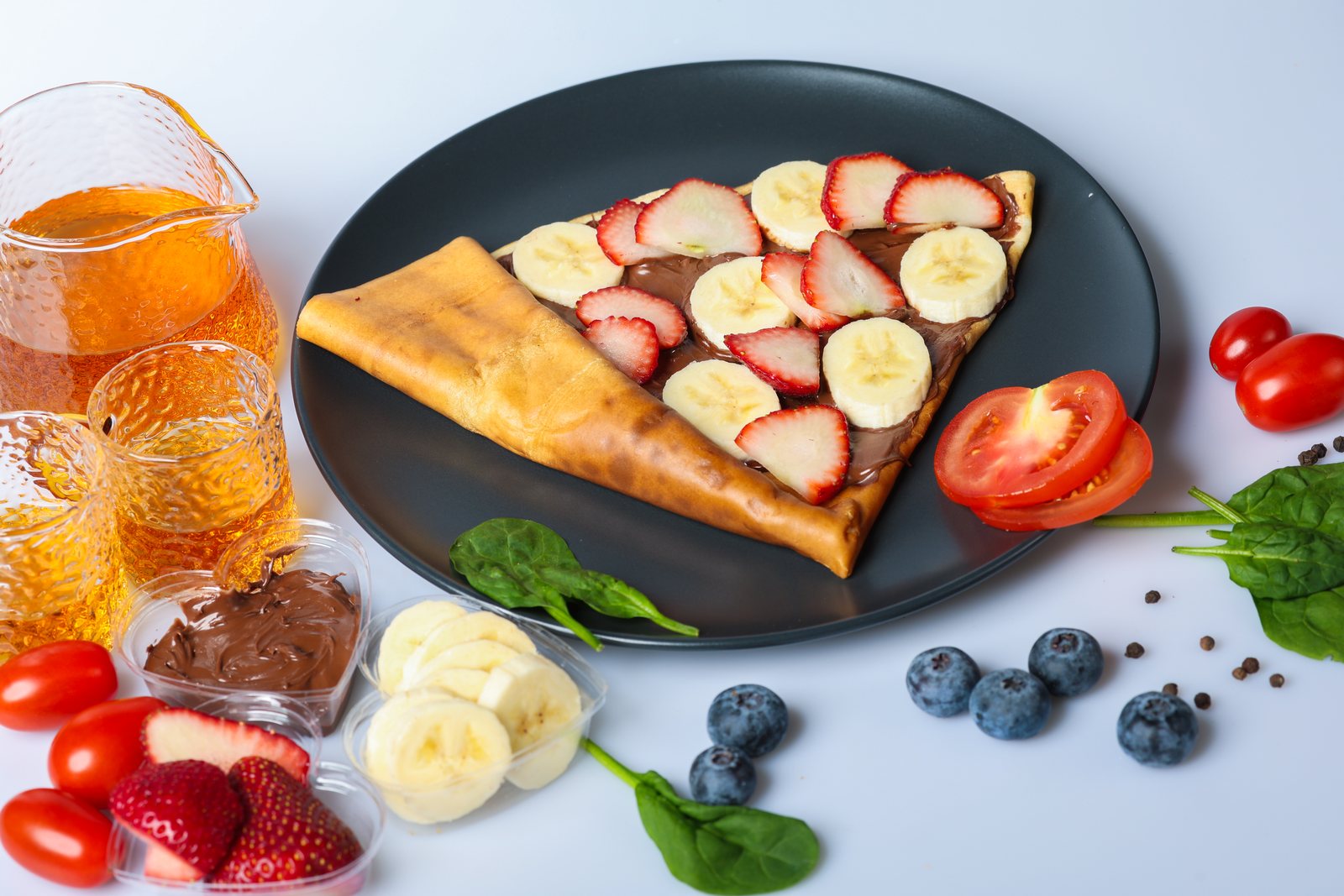 Our French Kiss crêpe with Nutella, fresh strawberries and banana, photographed for Crêpe Café